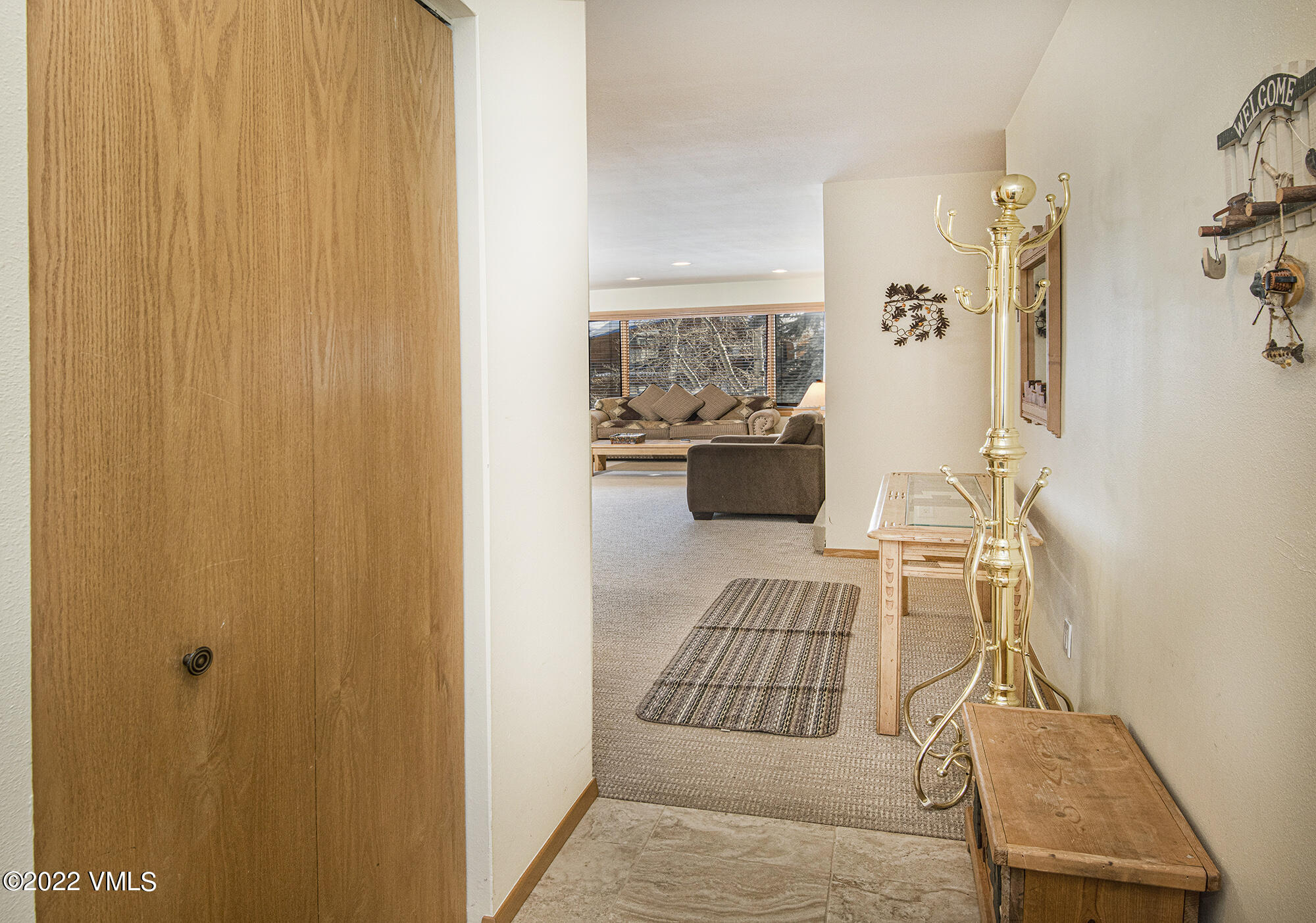 1030 Lions Ridge Loop, Unit 201 Vail, CO 81657 - Photo 13 of 29 a bedroom with a bed and lamp