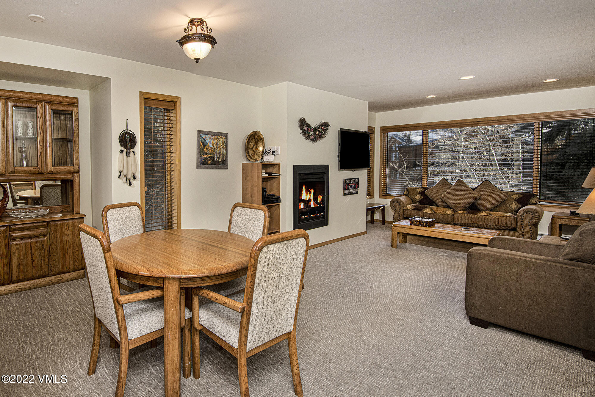 1030 Lions Ridge Loop, Unit 201 Vail, CO 81657 - Photo 4 of 29 a living room with furniture and a large window
