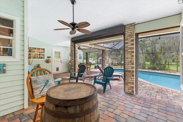 a view of a garden with plants and a fountain