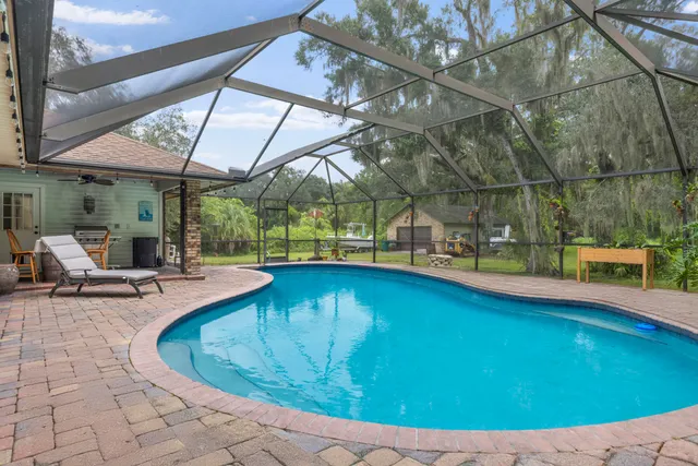 a backyard of a house with lots of green space