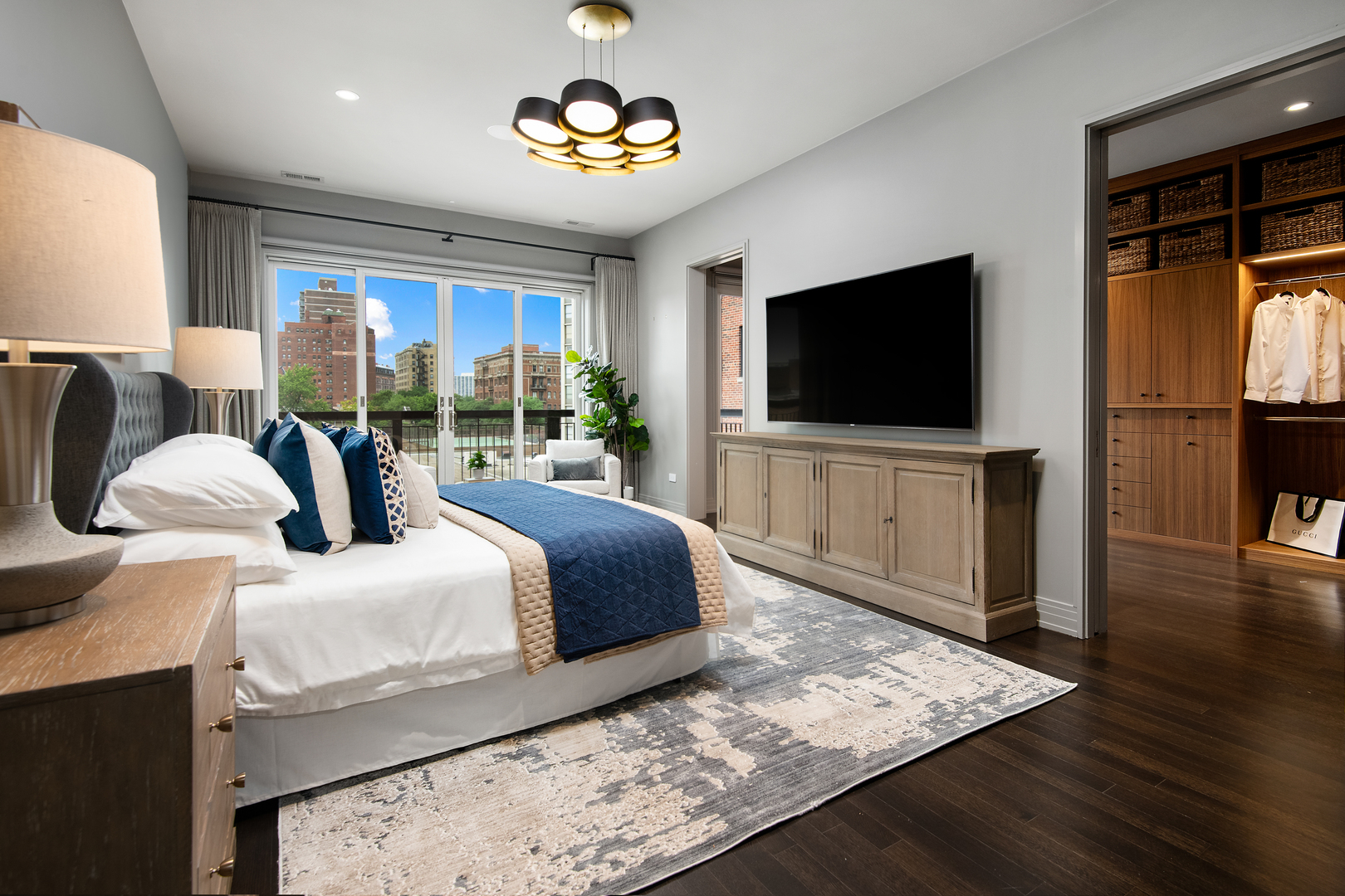 416 West Deming Place, Unit 4 Chicago, IL 60614 - Photo 18 of 36 a bedroom with a bed and a flat screen television