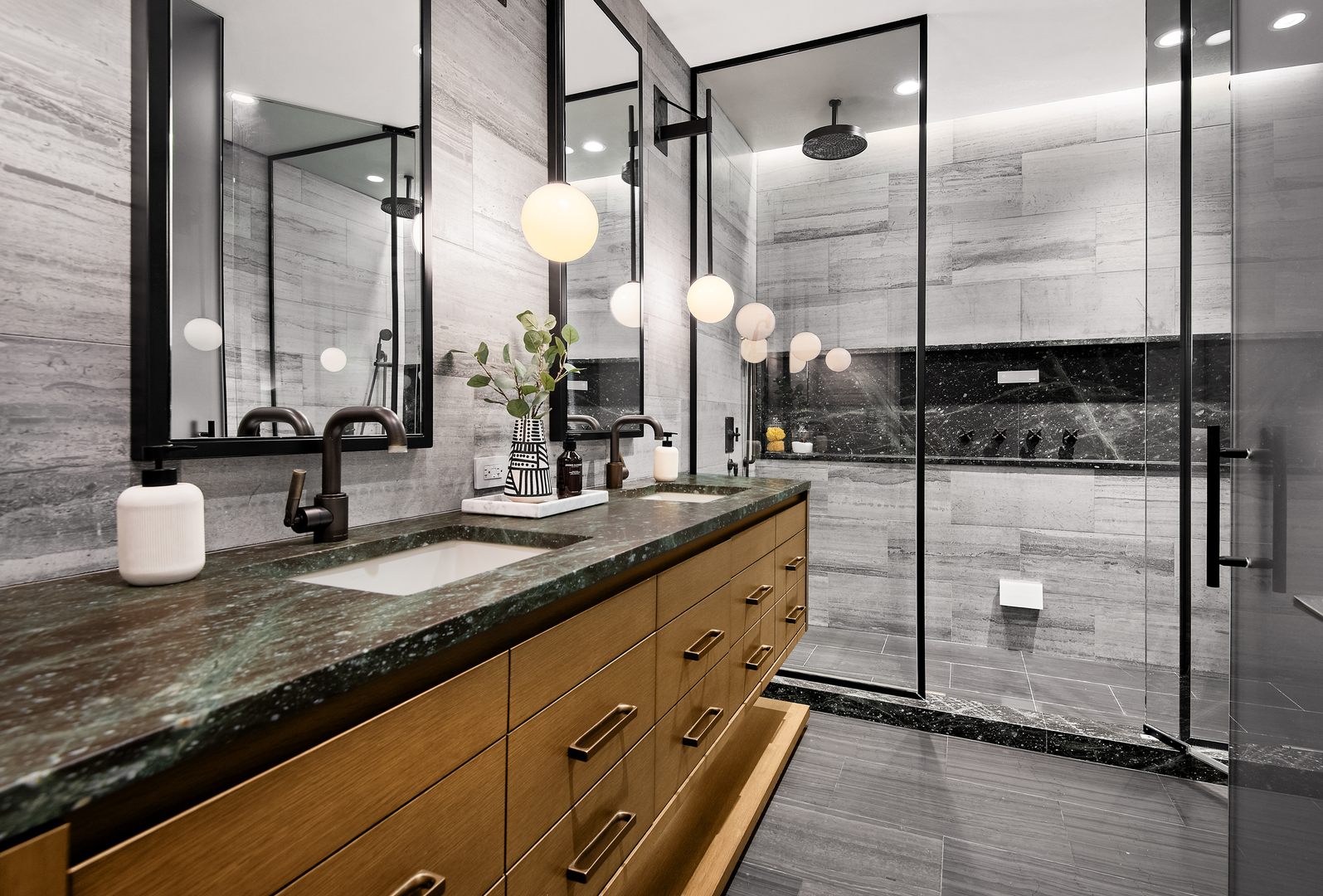 416 West Deming Place, Unit 4 Chicago, IL 60614 - Photo 21 of 36 a bathroom with a granite countertop sink a mirror and shower