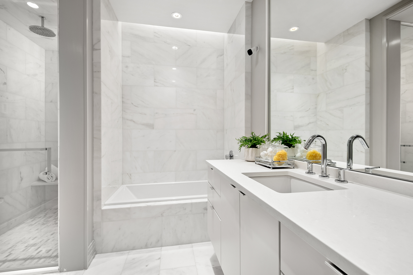 416 West Deming Place, Unit 4 Chicago, IL 60614 - Photo 23 of 36 a bathroom with a sink and a mirror