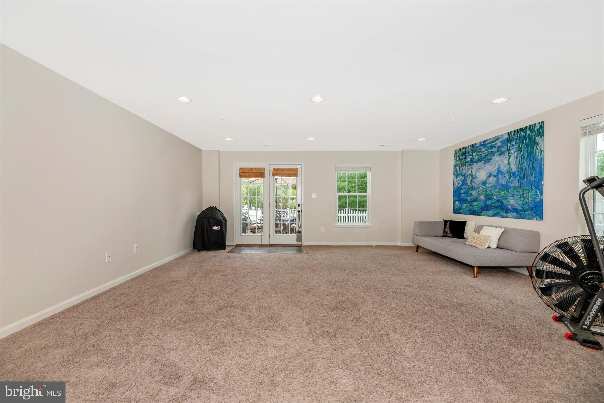 2055 Spring Run Circle Frederick, MD 21702 - Photo 6 of 31 Finished Rec Room with Access to Backyard