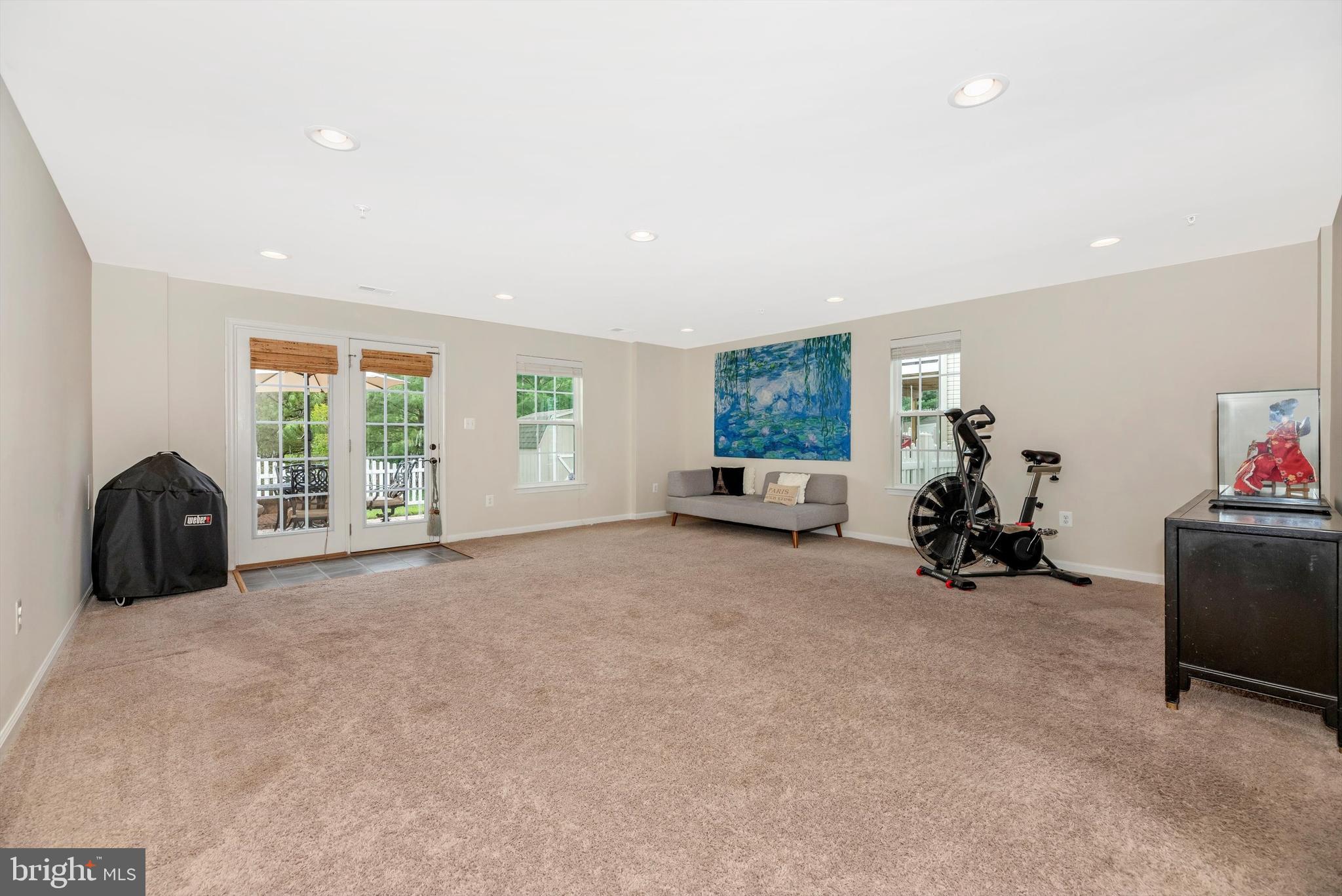 2055 Spring Run Circle Frederick, MD 21702 - Photo 7 of 31 Finished Rec Room with Access to Backyard