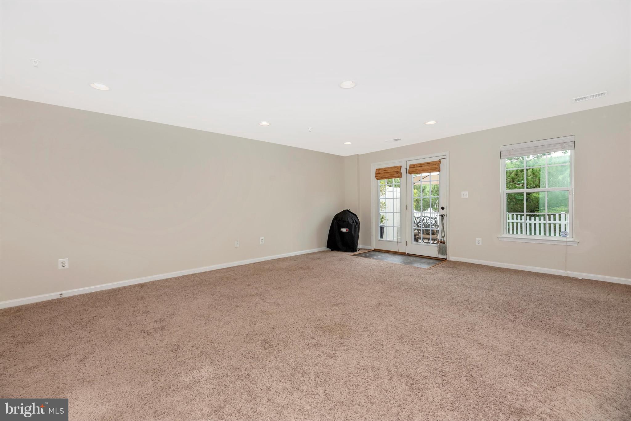 2055 Spring Run Circle Frederick, MD 21702 - Photo 8 of 31 Finished Rec Room with Access to Backyard
