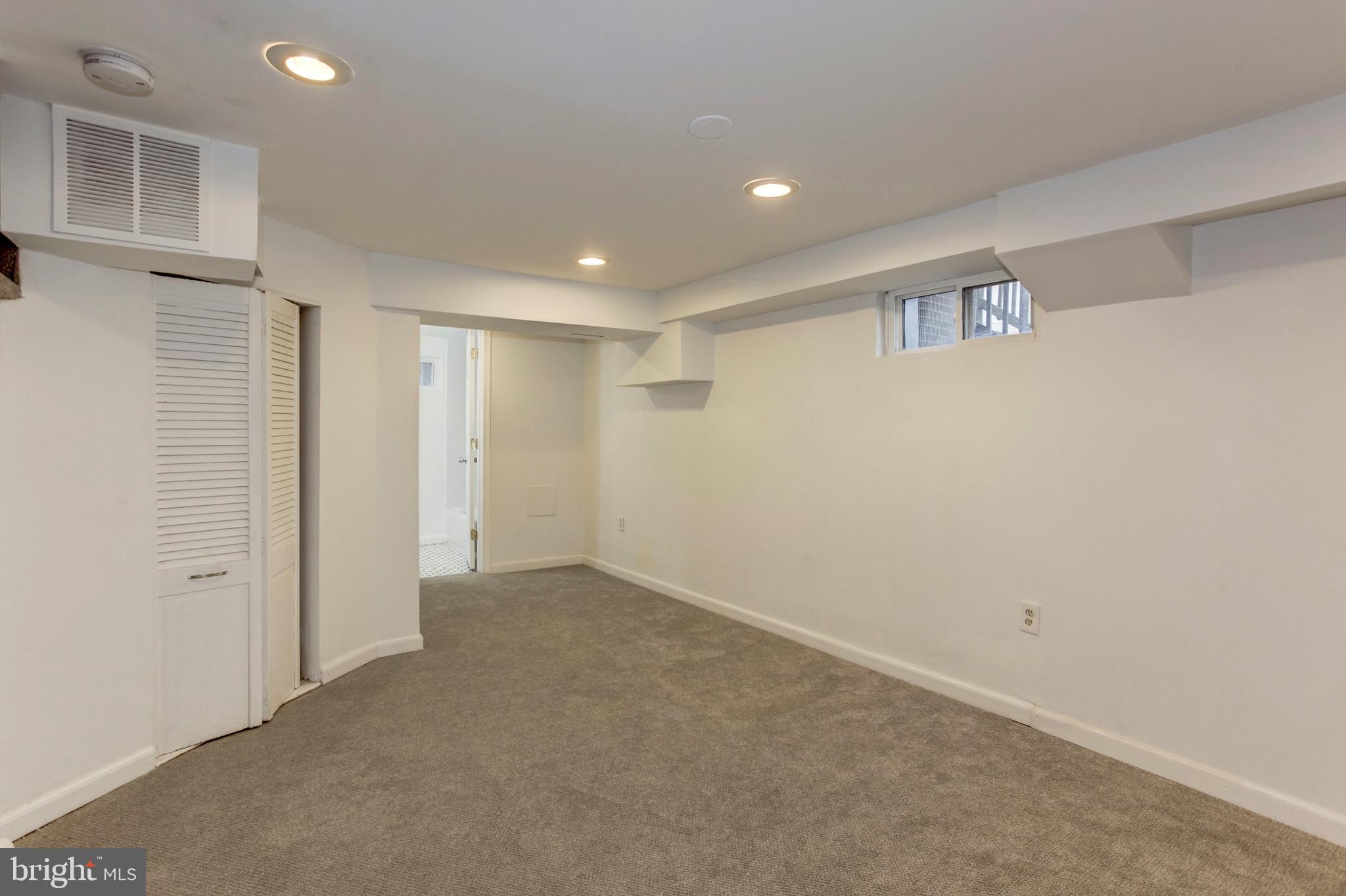 5173 Sheriff Road Northeast Washington, DC 20019 - Photo 22 of 35 Lower Level Family Room/Recreation/Office/Gym