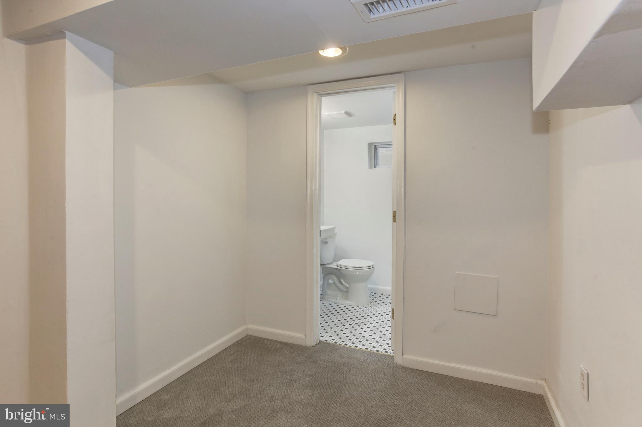 5173 Sheriff Road Northeast Washington, DC 20019 - Photo 24 of 35 Lower Level Family Room/Recreation/Office/Gym