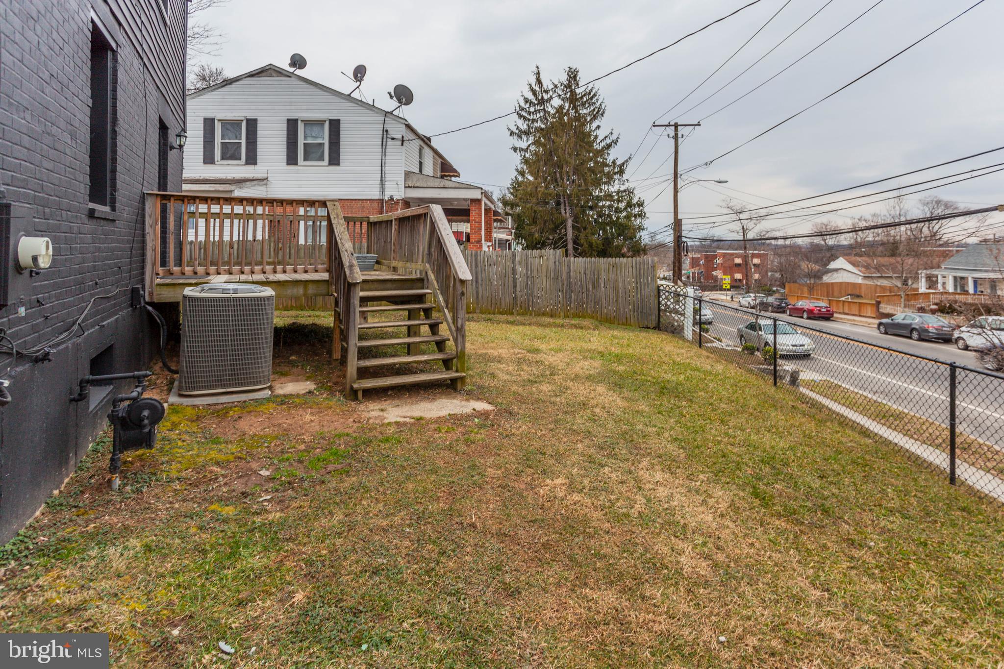 5173 Sheriff Road Northeast Washington, DC 20019 - Photo 31 of 35 Fenced Side Yard with Deck