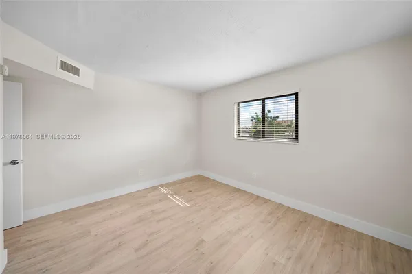 an empty room with a window