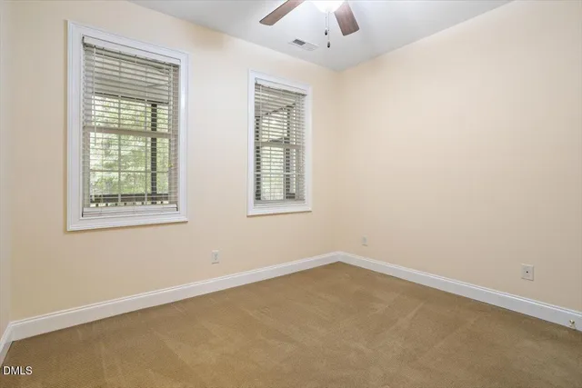 a kitchen with granite countertop a sink and cabinets