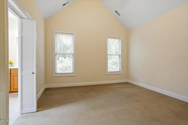 a spacious bathroom with a sink a mirror and a bathtub