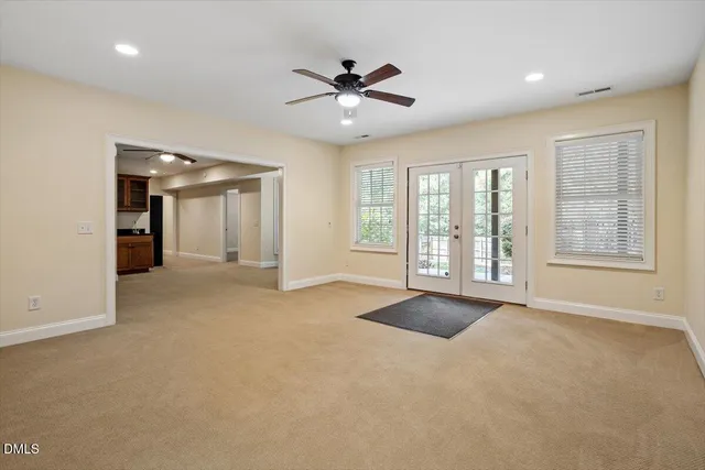 a kitchen with stainless steel appliances granite countertop a stove and a refrigerator