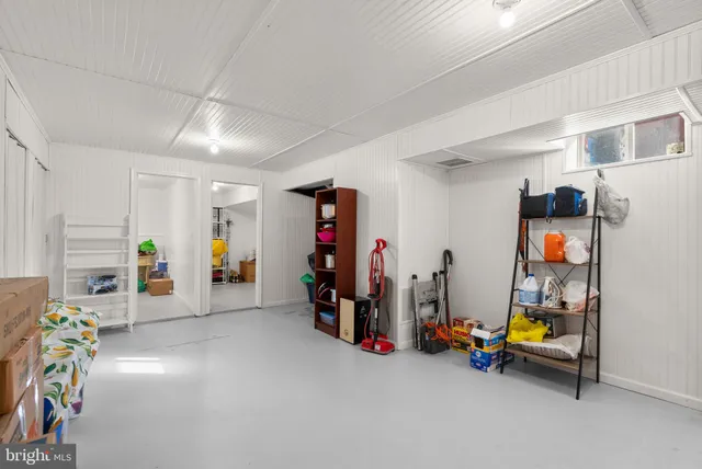 a view of game room with gym equipment