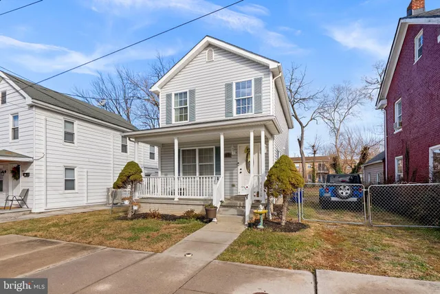 a front view of a house with a outdoor space