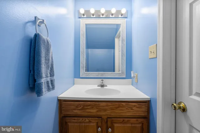 a sink with a sink and a mirror