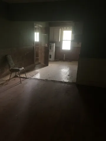 a bathroom with a tub a sink and a shower