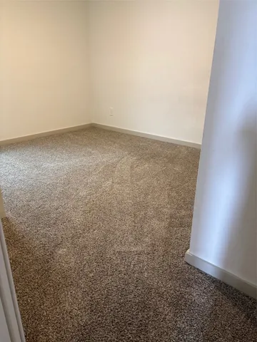 a bathroom with a toilet a sink and a shower