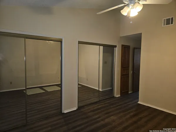 a view of a livingroom with wooden floor