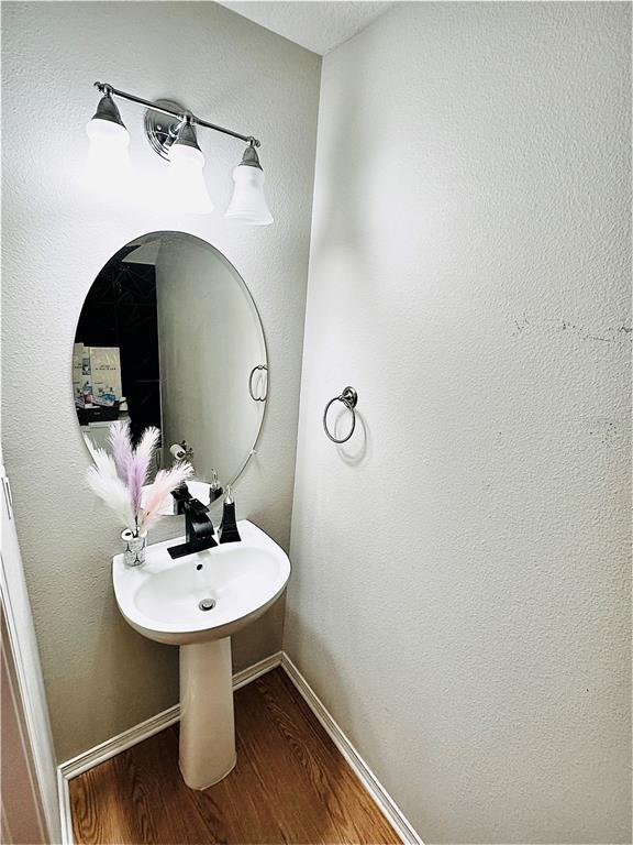 4411 Banyan Tree Place Riverview, FL 33578 - Photo 11 of 27 a bathroom with a sink and a mirror