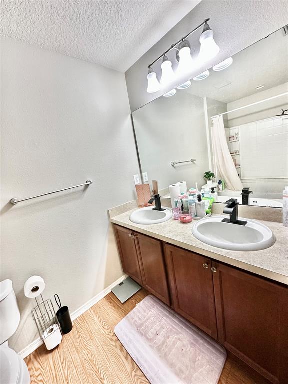 4411 Banyan Tree Place Riverview, FL 33578 - Photo 16 of 27 a bathroom with a sink and a mirror