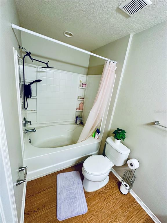 4411 Banyan Tree Place Riverview, FL 33578 - Photo 17 of 27 a bathroom with a sink toilet and shower