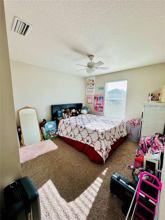 4411 Banyan Tree Place Riverview, FL 33578 - Photo 18 of 27 a bedroom with a bed furniture and a window