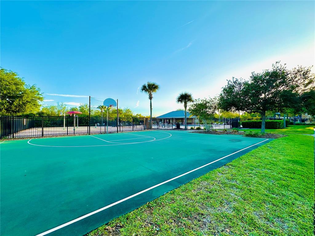 4411 Banyan Tree Place Riverview, FL 33578 - Photo 26 of 27 a view of a golf course with a lake