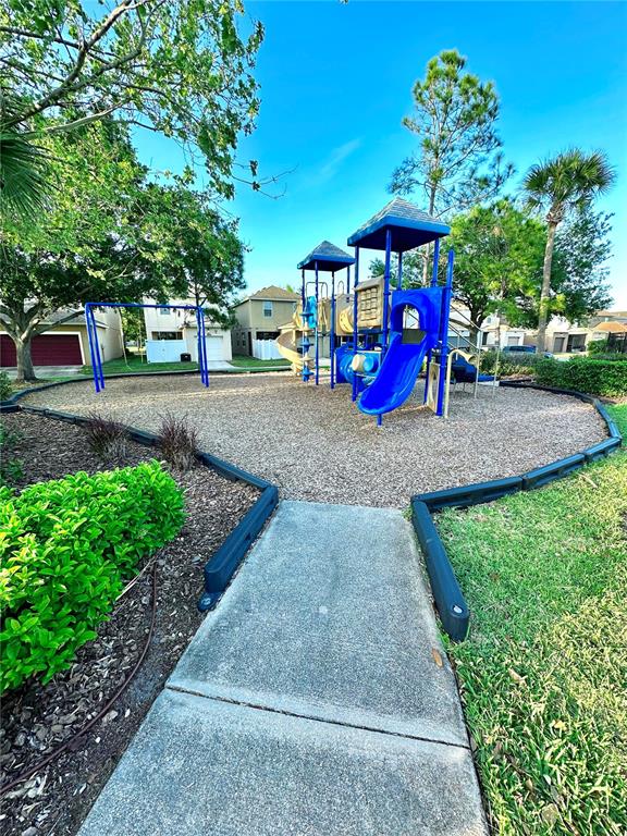 4411 Banyan Tree Place Riverview, FL 33578 - Photo 27 of 27 a view of outdoor space with garden and trees