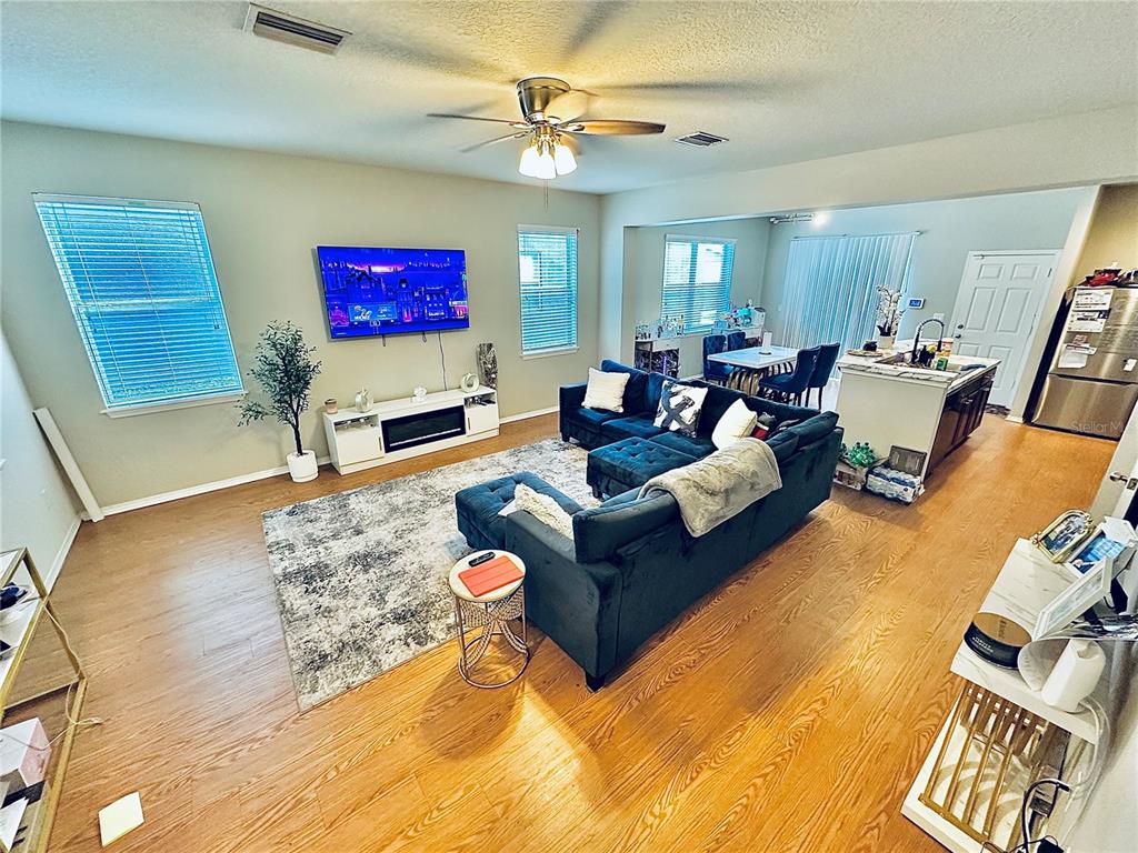 4411 Banyan Tree Place Riverview, FL 33578 - Photo 5 of 27 a living room with furniture and a flat screen tv