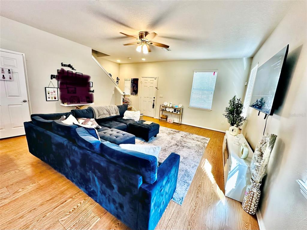 4411 Banyan Tree Place Riverview, FL 33578 - Photo 6 of 27 a living room with furniture and a flat screen tv