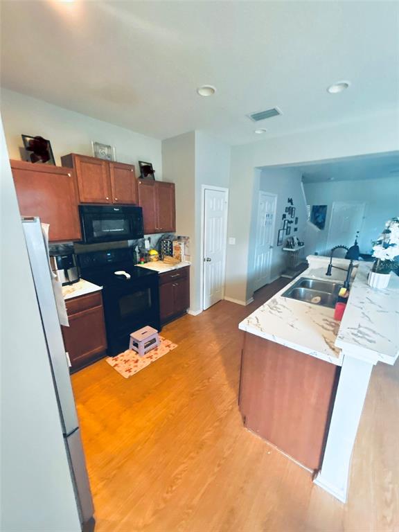 4411 Banyan Tree Place Riverview, FL 33578 - Photo 10 of 27 a room with a bed and a television