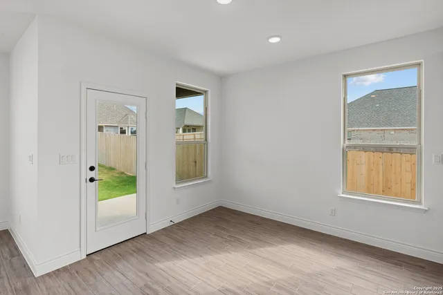 an empty room with windows