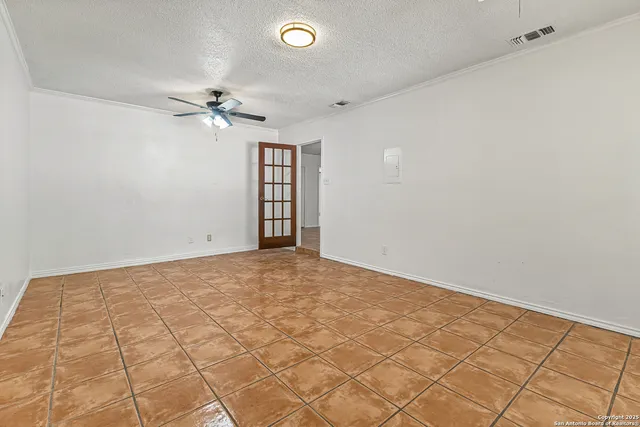 a bathroom with a granite countertop sink a toilet and bathtub