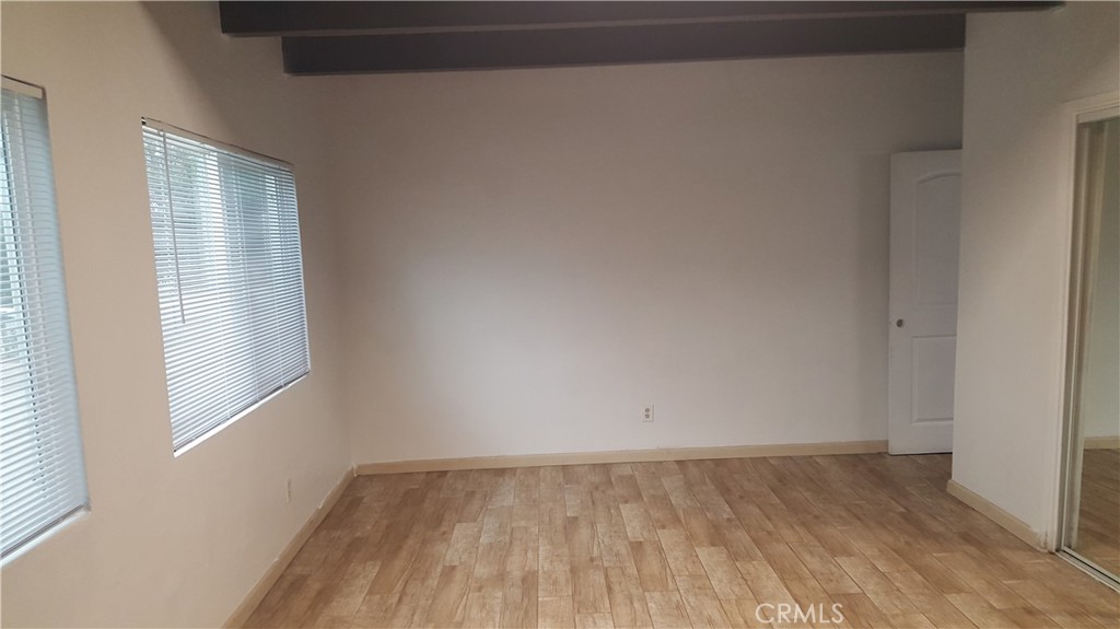 611 Los Osos Valley Road Los Osos, CA 93402 - Photo 11 of 13 a view of an empty room and wooden floor