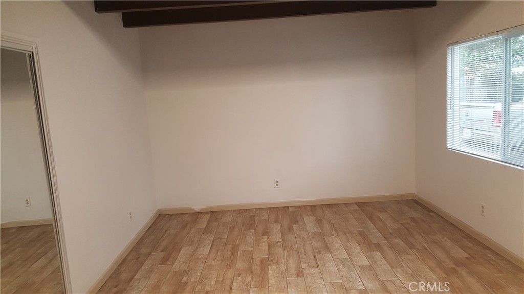 611 Los Osos Valley Road Los Osos, CA 93402 - Photo 12 of 13 a view of a room that has wooden floor and large window