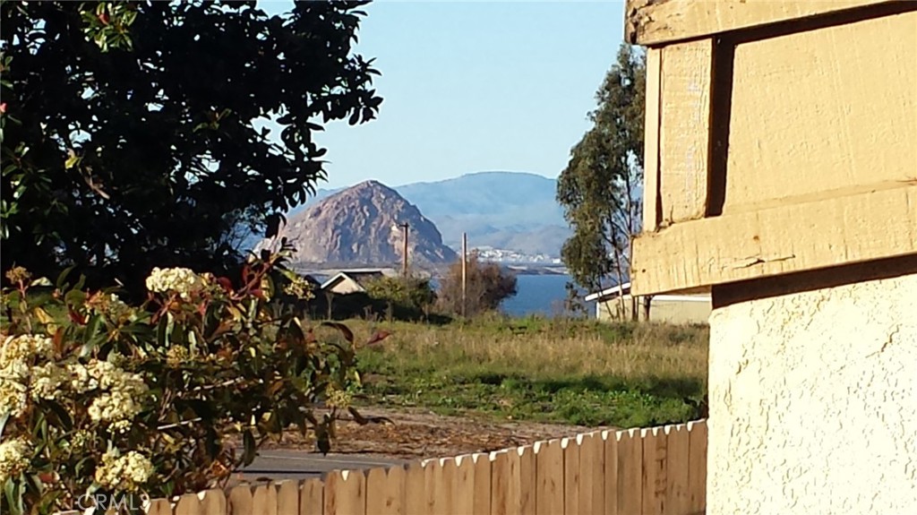 611 Los Osos Valley Road Los Osos, CA 93402 - Photo 2 of 13 a view of a house with a tree in the background