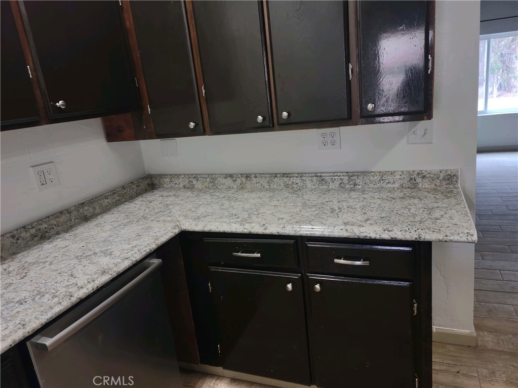 611 Los Osos Valley Road Los Osos, CA 93402 - Photo 7 of 13 a kitchen with a sink and cabinets