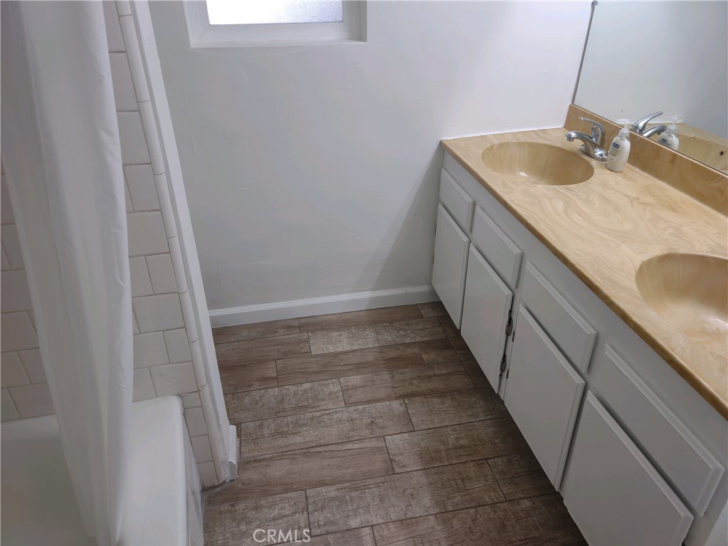 611 Los Osos Valley Road Los Osos, CA 93402 - Photo 10 of 13 a bathroom with a sink and a mirror