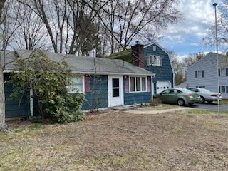 41 Elizabeth Road Billerica, MA 01821 - Photo 18 of 18 a front view of a house with garden