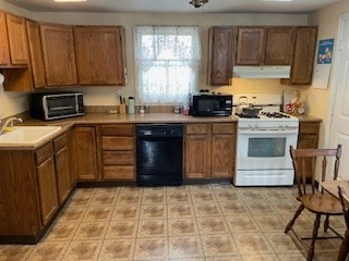 41 Elizabeth Road Billerica, MA 01821 - Photo 2 of 18 a kitchen with a stove sink and cabinets