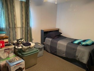 41 Elizabeth Road Billerica, MA 01821 - Photo 8 of 18 a bed sitting in a bedroom next to a window