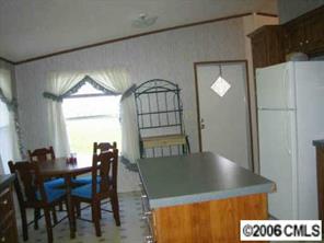 1377 Colonial Road Clover, SC 29710 - Photo 6 of 8 a view of a dining room with furniture and window