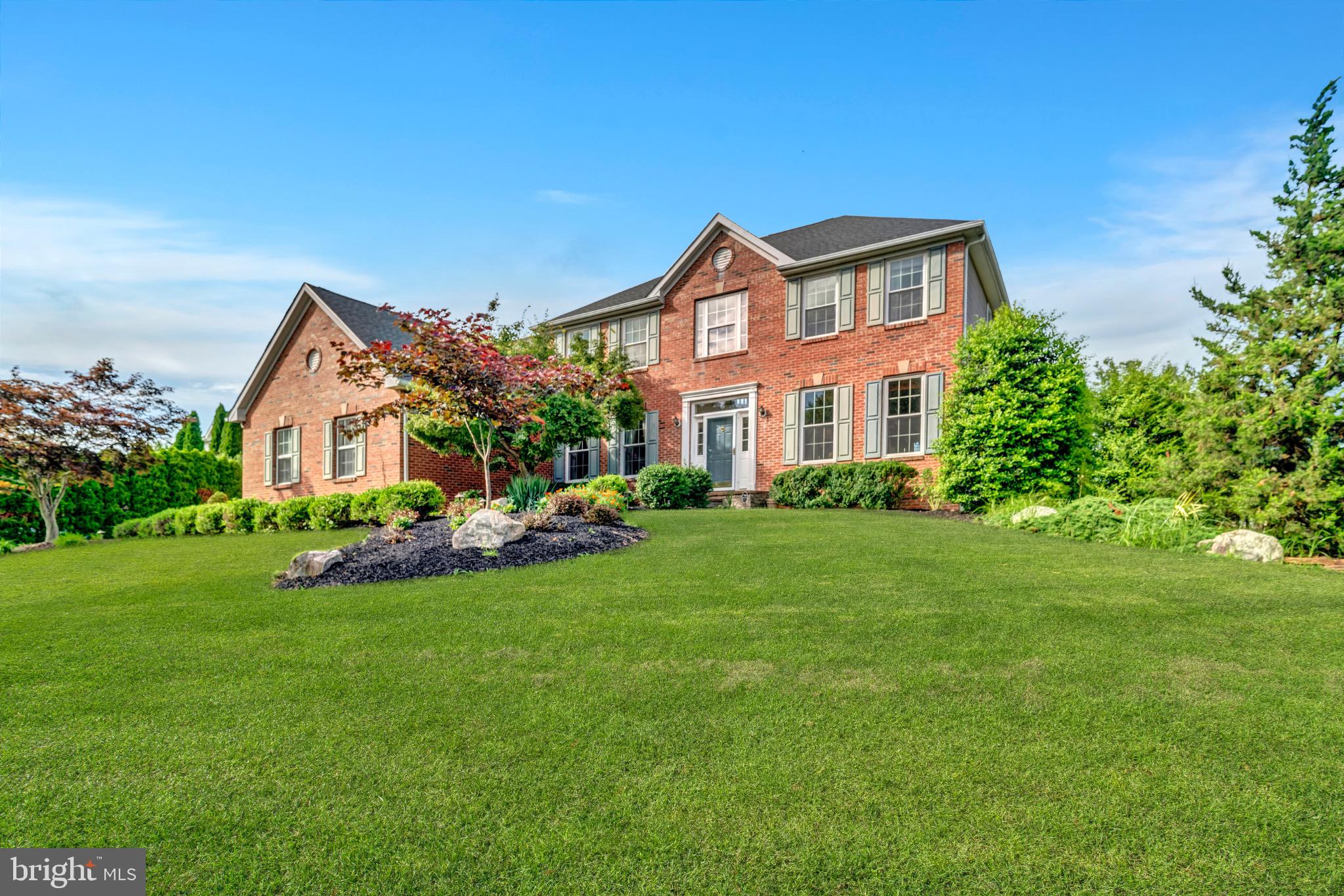 7 Anderson Lane Robbinsville, NJ 08691 - Photo 1 of 54 a front view of house with yard and green space