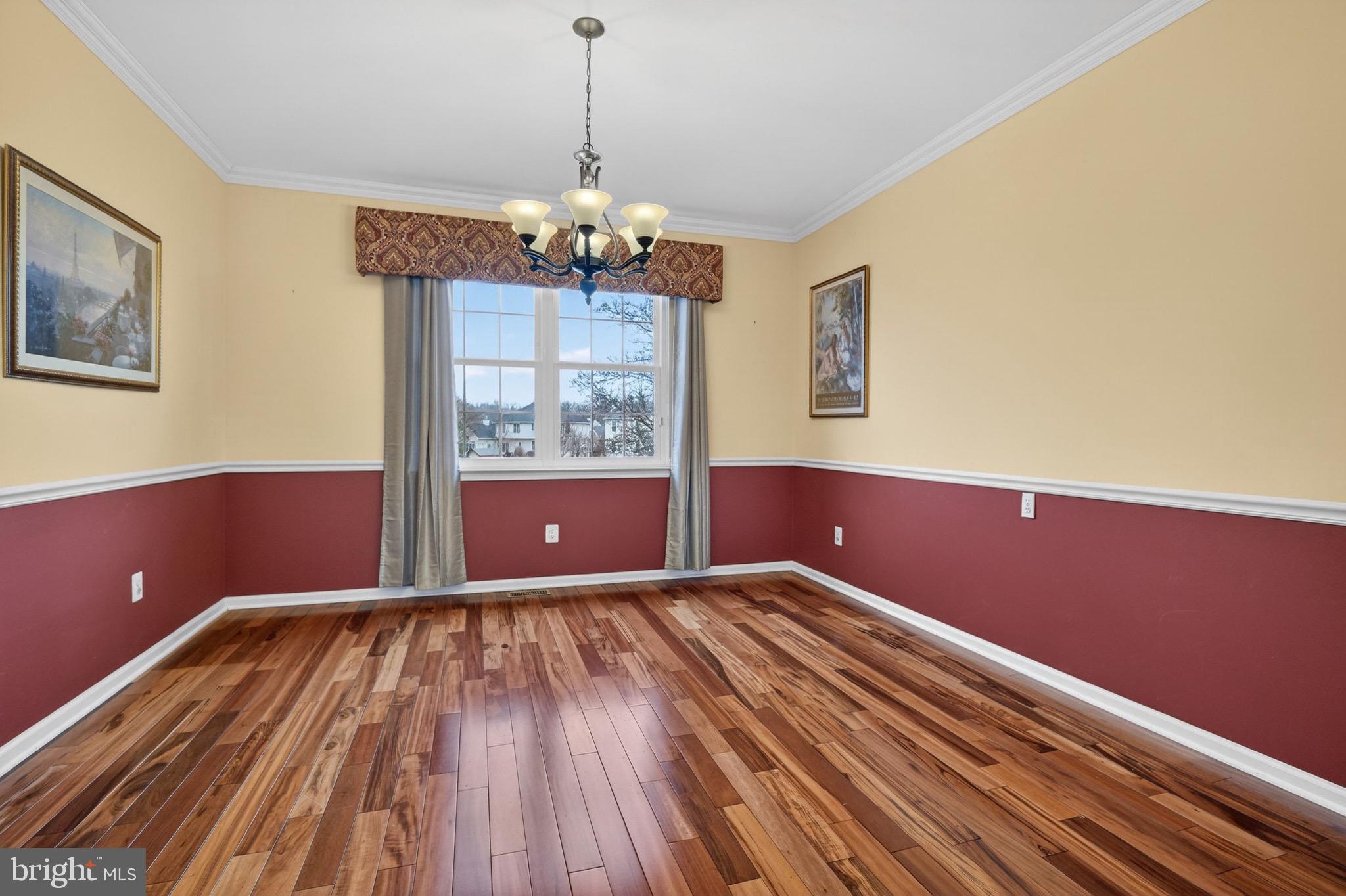 7 Anderson Lane Robbinsville, NJ 08691 - Photo 20 of 54 a view of a room with wooden floors and chandelier