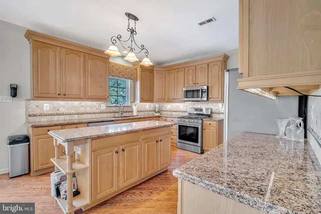 a dining room with furniture window wooden floor