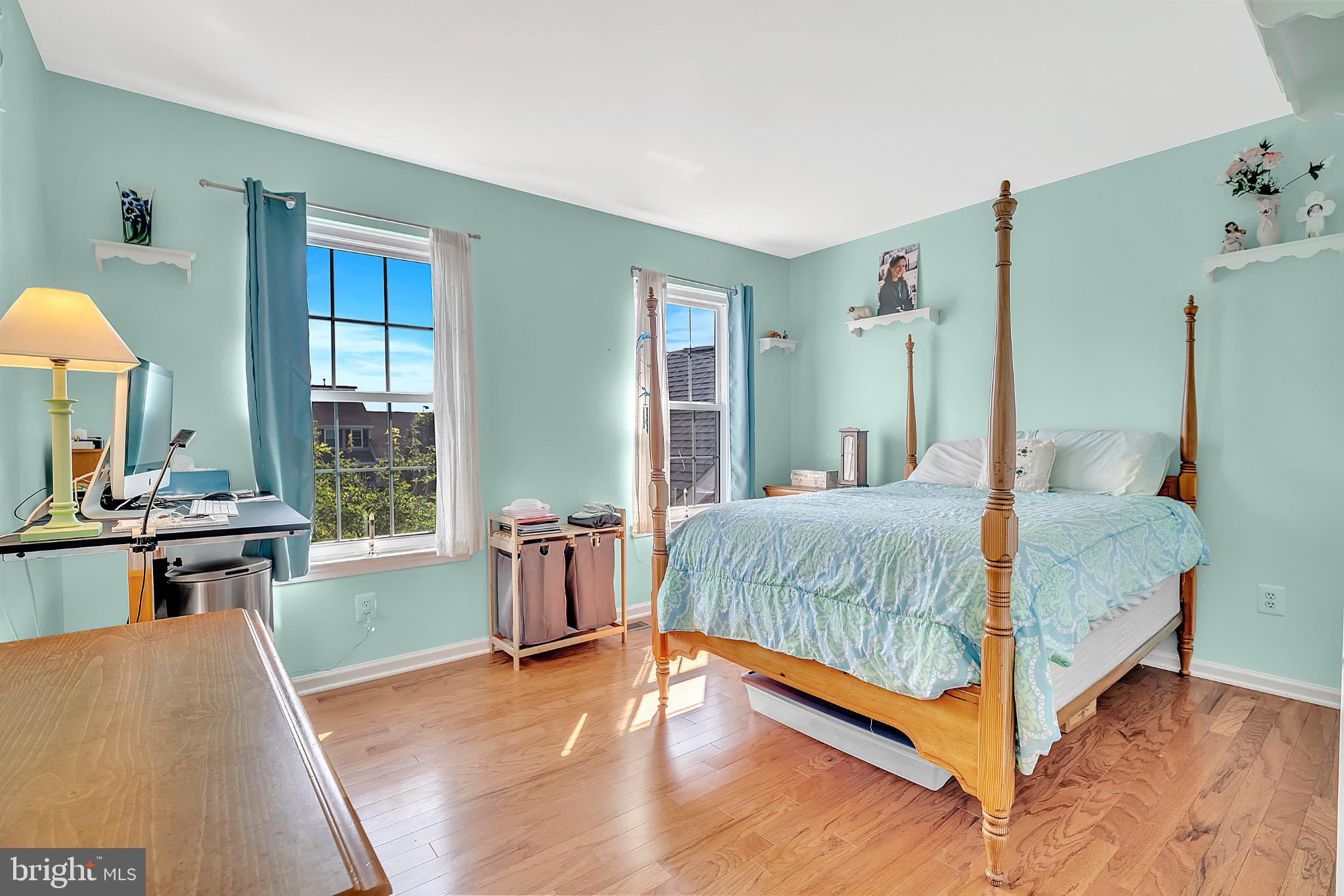 7 Anderson Lane Robbinsville, NJ 08691 - Photo 35 of 54 a bedroom with a bed and wooden floor