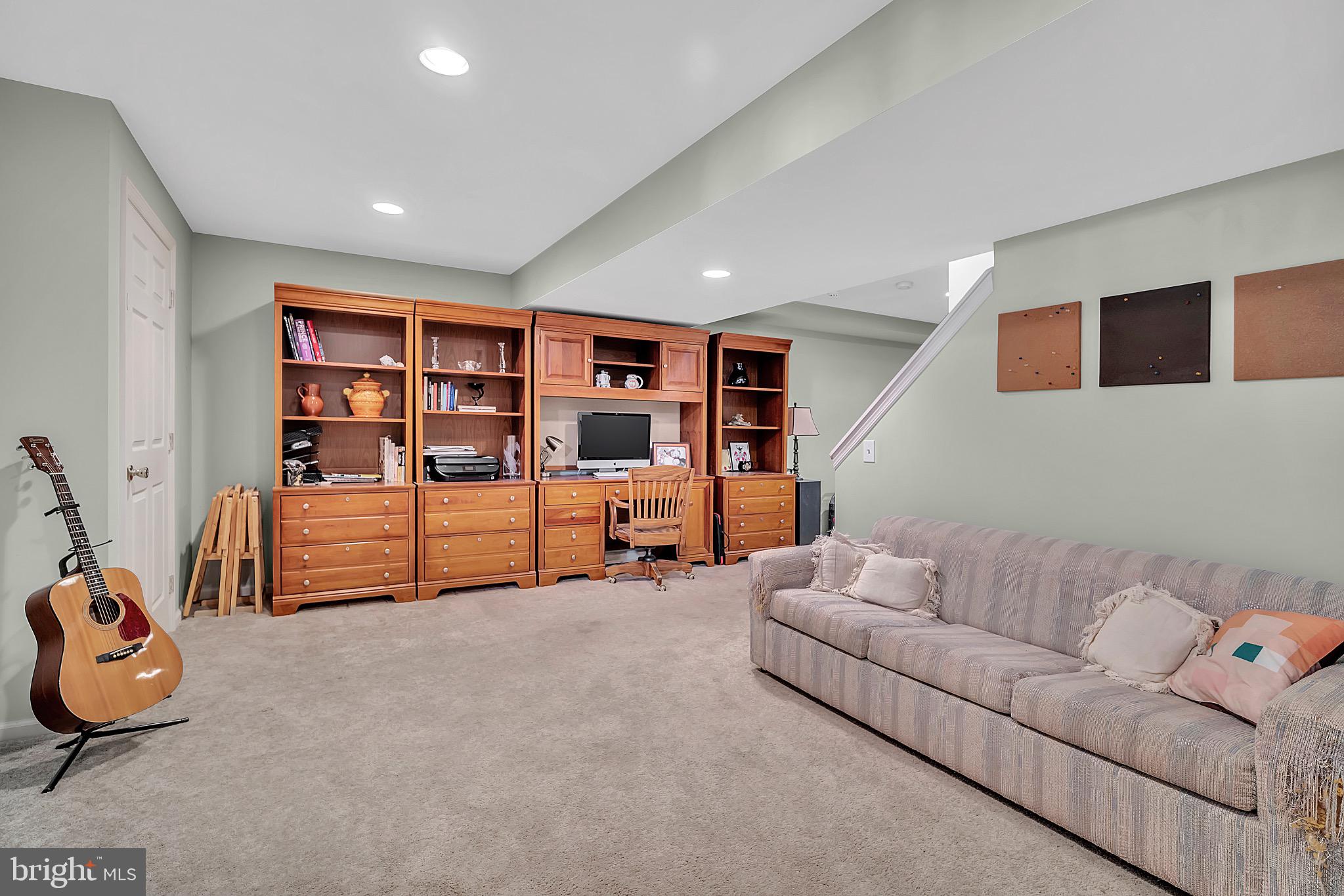 7 Anderson Lane Robbinsville, NJ 08691 - Photo 40 of 54 a living room with furniture and gym equipment