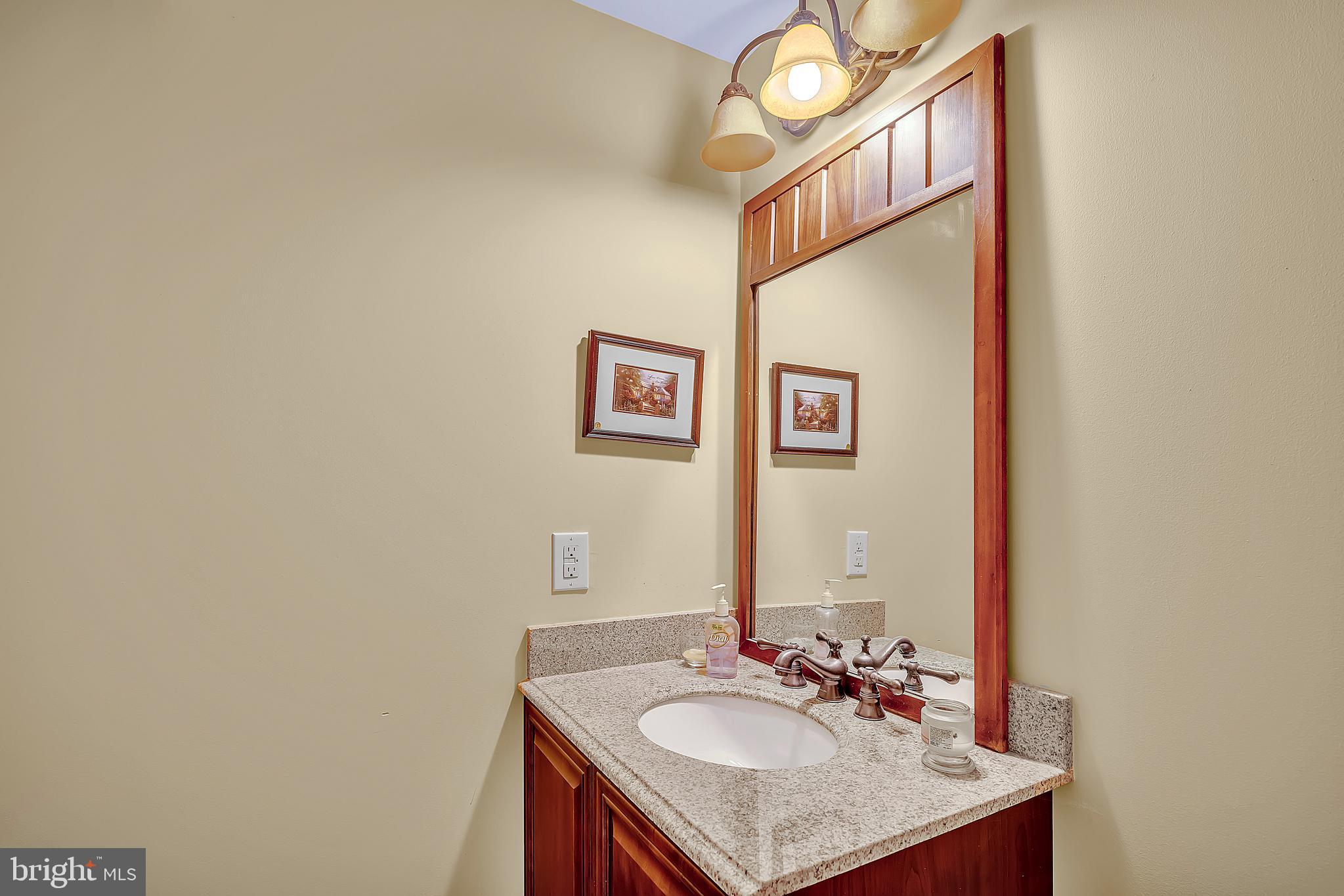 7 Anderson Lane Robbinsville, NJ 08691 - Photo 42 of 54 a bathroom with a sink and a mirror