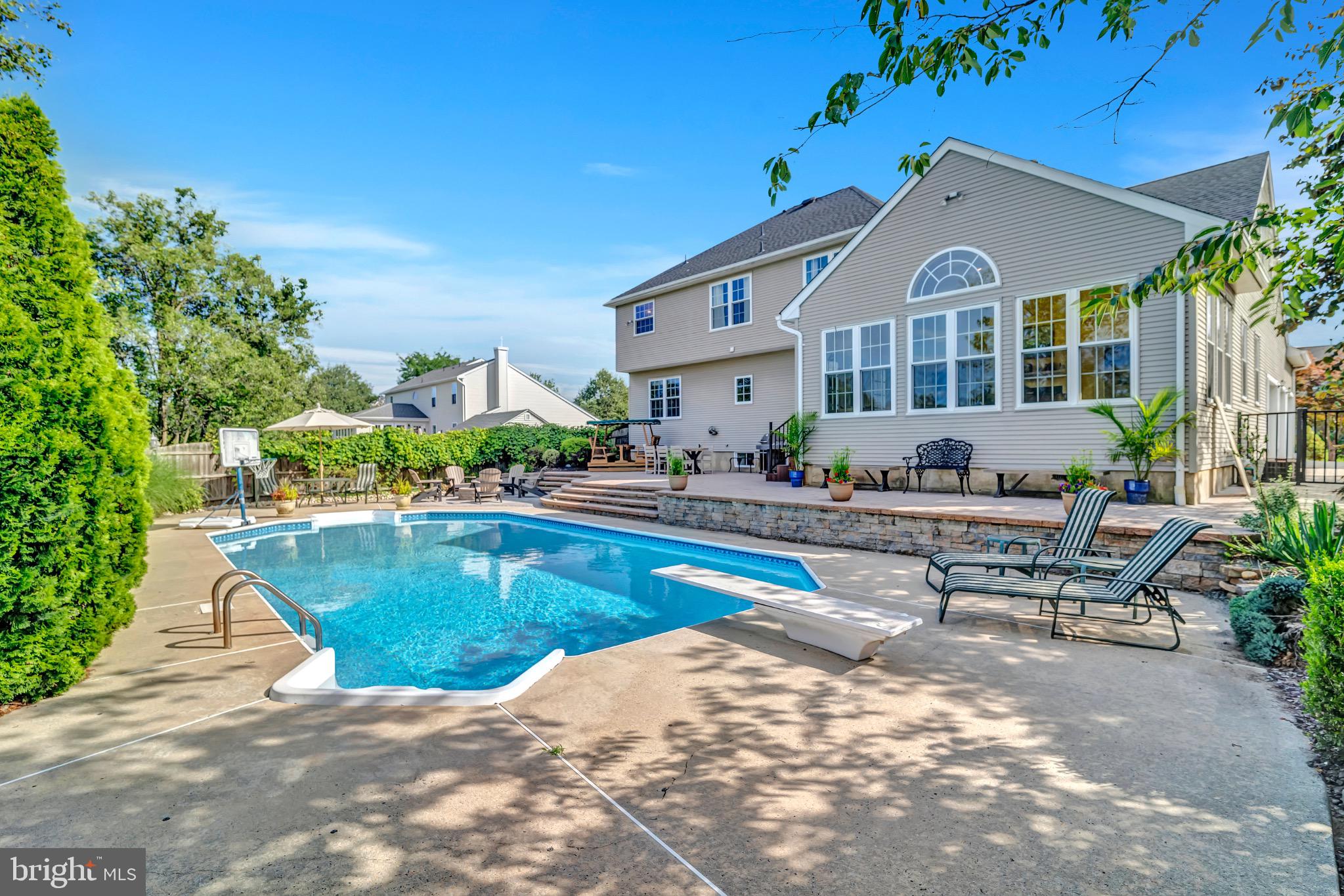 7 Anderson Lane Robbinsville, NJ 08691 - Photo 43 of 54 Serene backyard oasis with inviting pool.